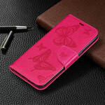 Housse Samsung Galaxy A10s Les Papillons en Vol avec Lanière